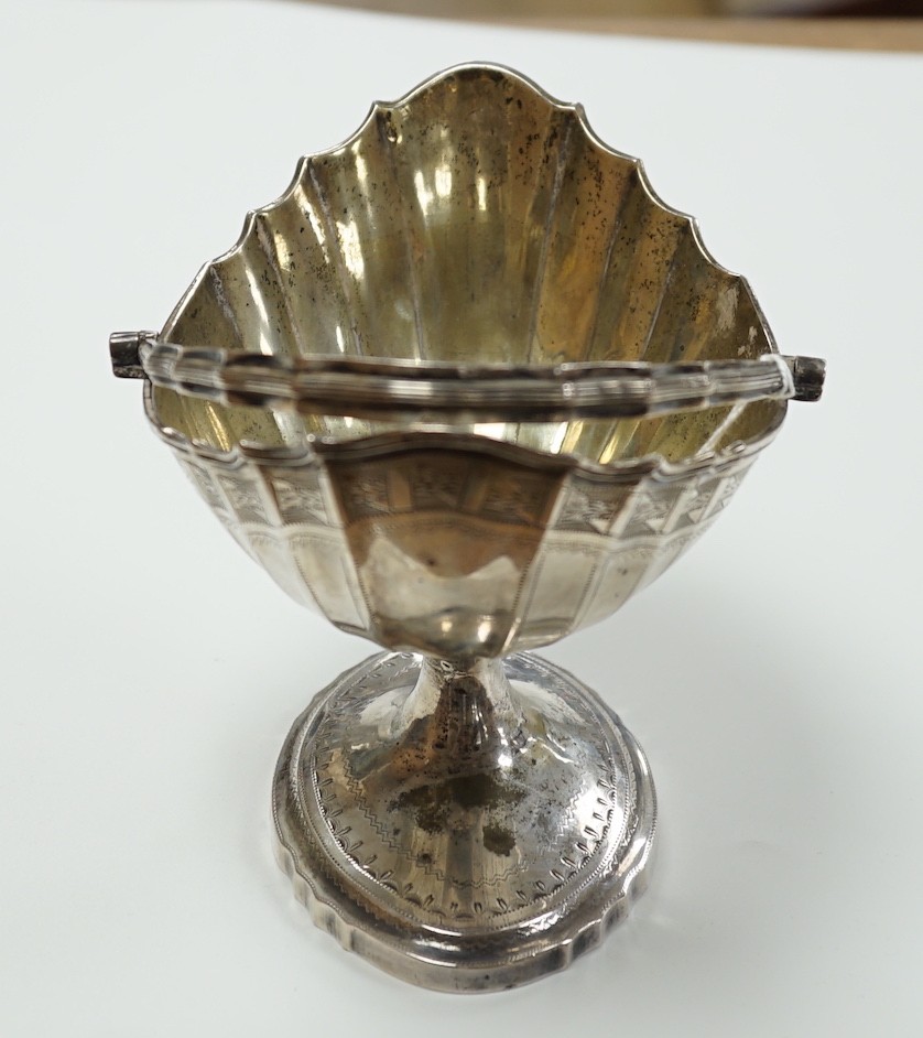 A George III Irish engraved silver bats wing oval shaped pedestal sugar basket, by Richard Sawyer, Dublin, 1803, length 17.5cm, 9oz.